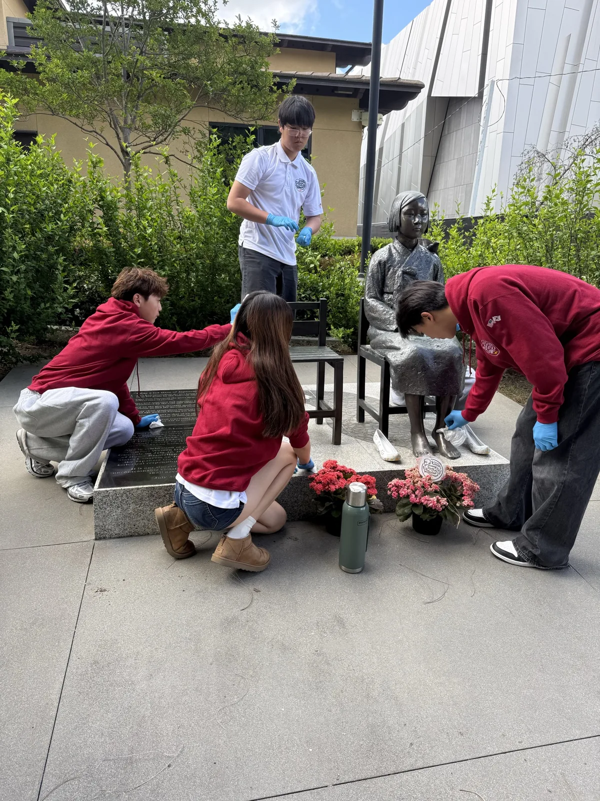 Tending the area around the Peace Monument