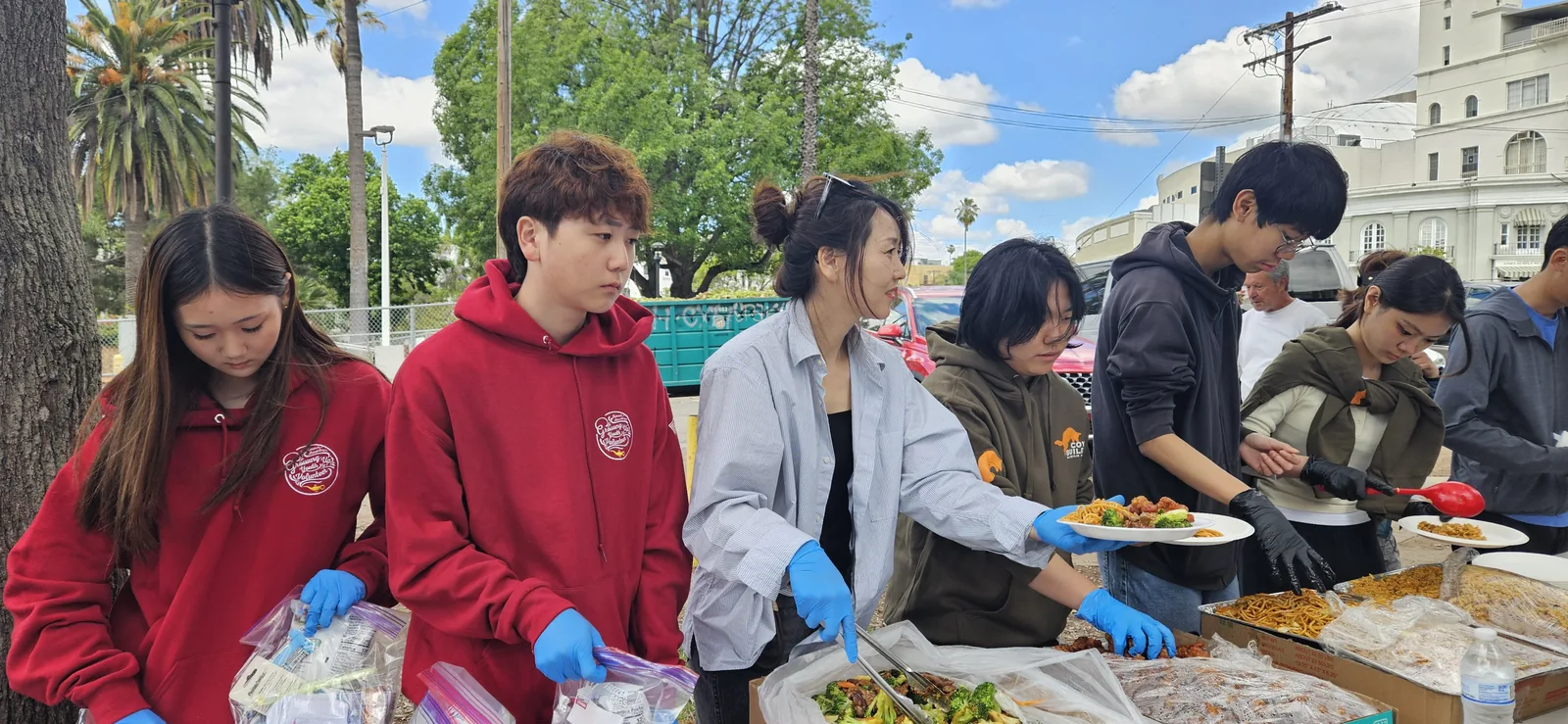 Working together at a community food distribution