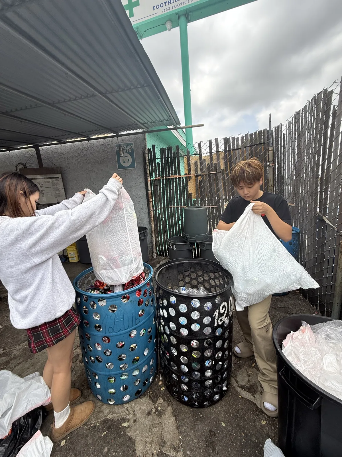 Working through bags of recyclables