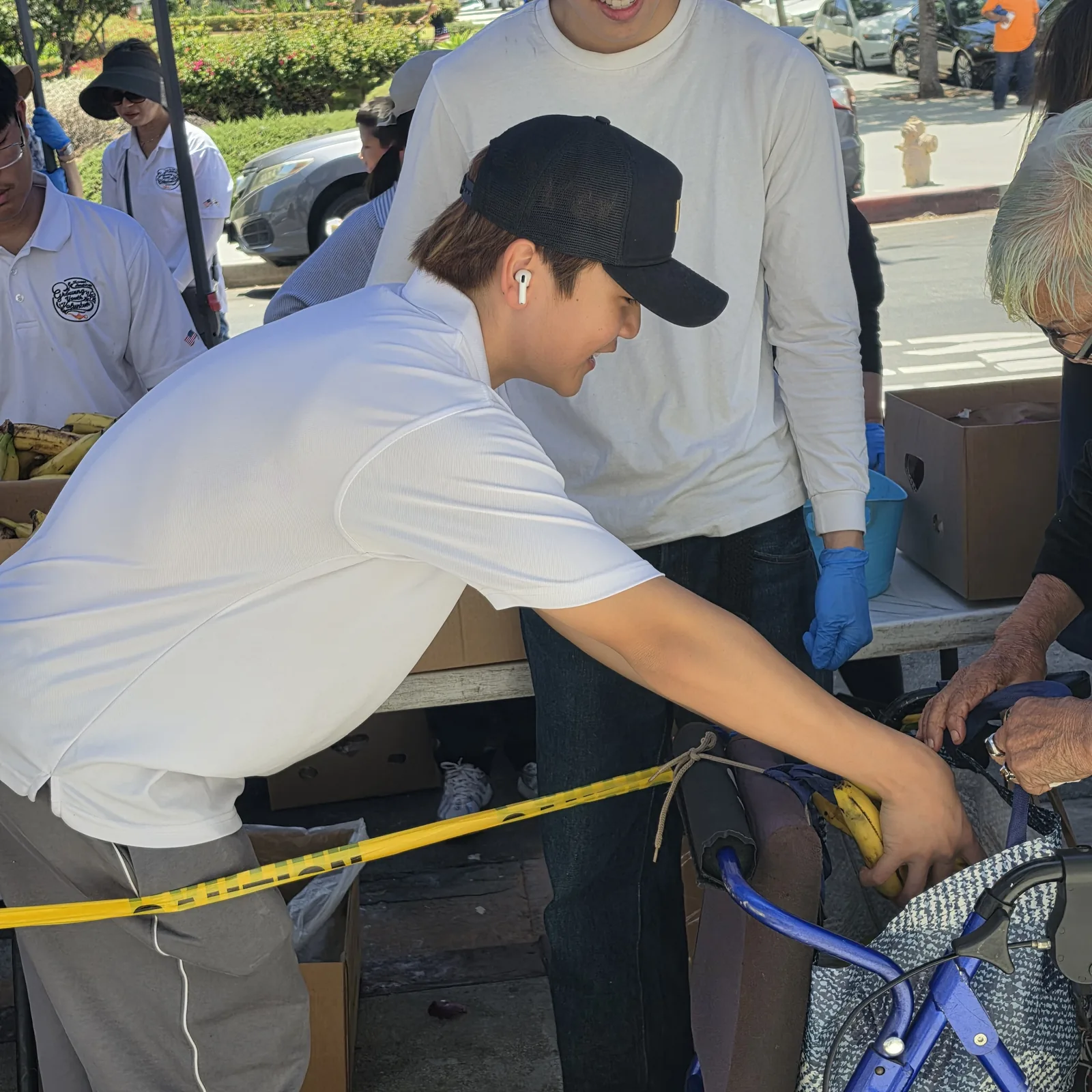 Helping distribute food and everyday necessities