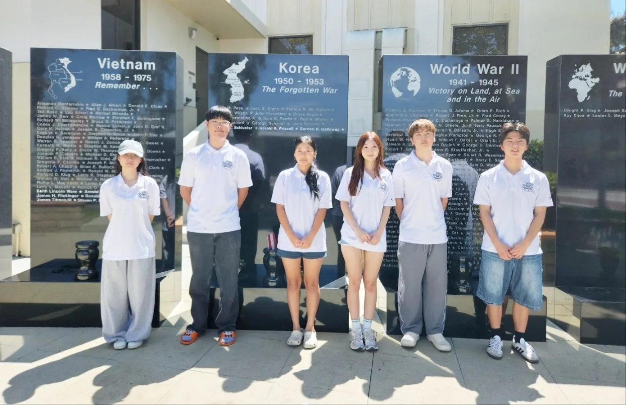 Volunteers together at the veterans memorial