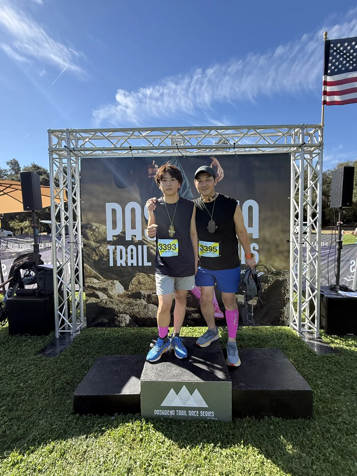 At the finish, medals in hand